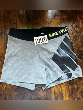 Nike Pro Women's Gray Shorts with Black Logo and Neon Waistband